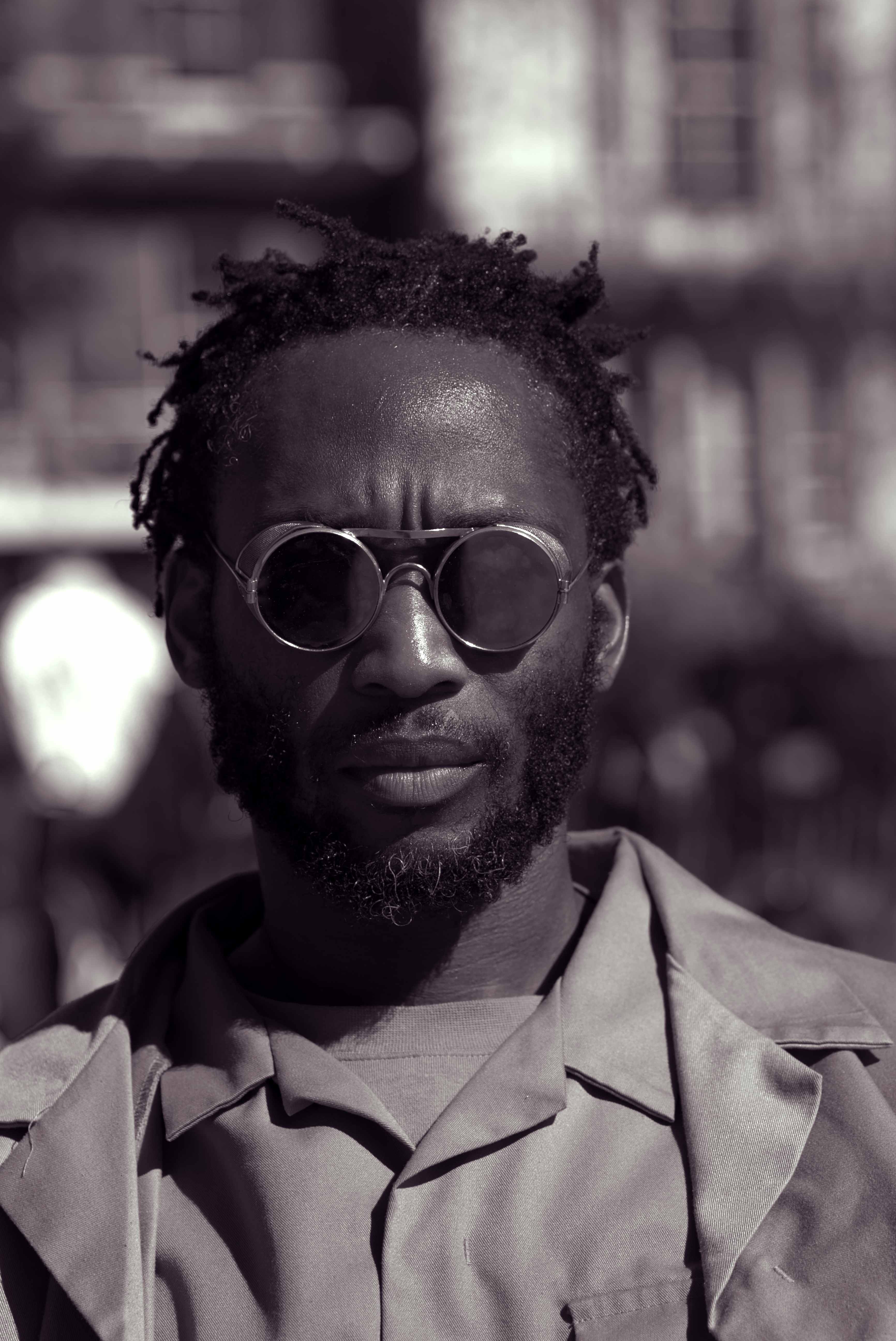 Portrait: Warrior King - Quiet confidence standing in light and shadow.